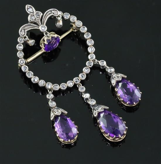 A late Victorian gold and silver, pear and round cut amethyst and rose cut diamond set openwork drop brooch, 46mm.